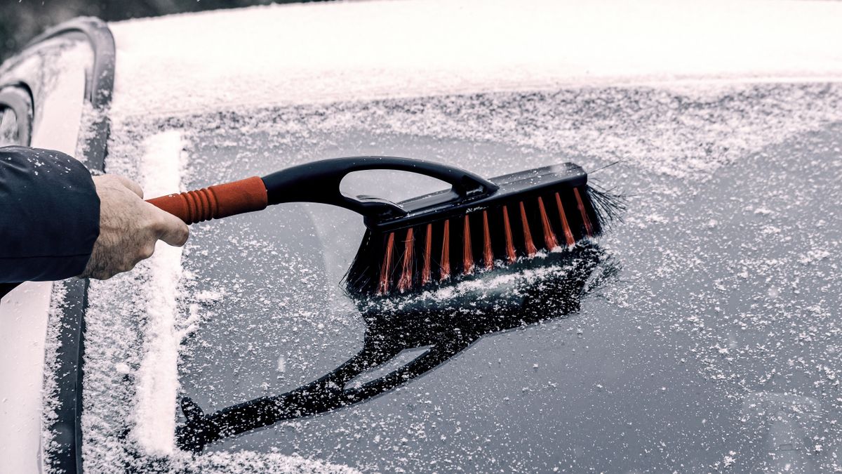 Removing,Snow,From,Car.,Clean,Car,Window,In,Winter,From