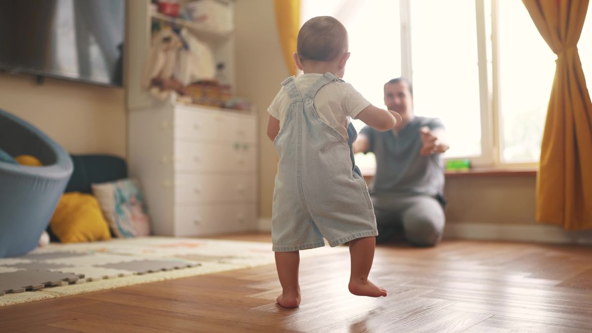 Baby,First,Steps.,Baby,Goes,Her,Father,At,Window,Learns