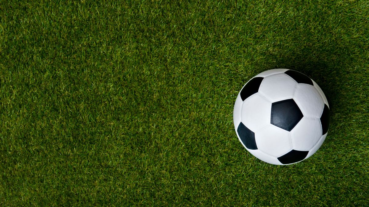 Top,View,Of,Soccer,Or,Football,On,Grass,Field