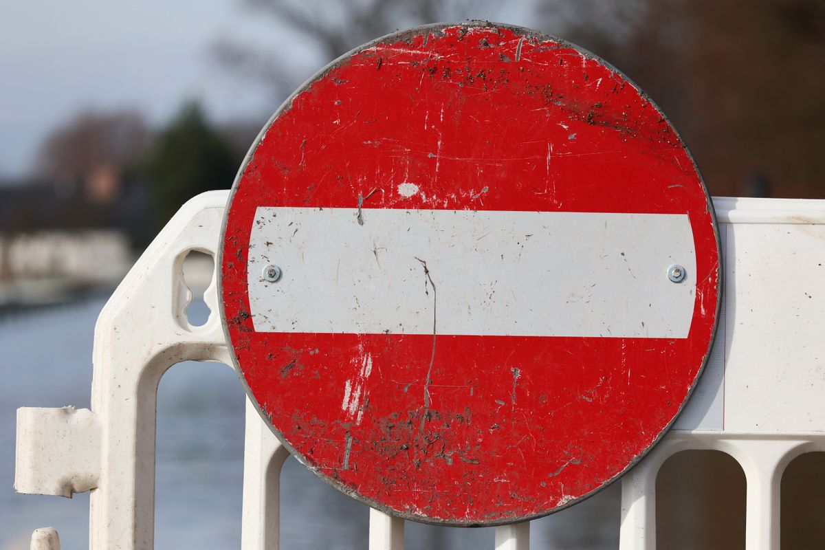 Roadblock.,Closed,Road,Flooded,With,River,Water.,Flood