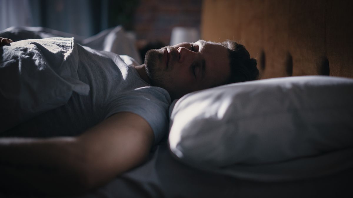 Top,View,Apartment,Bedroom:,Handsome,Young,Man,Sleeping,Cozily,On